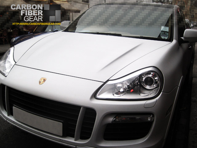  saw this Porsche Cayenne outside of Harrod's with white 3M carbon fiber 