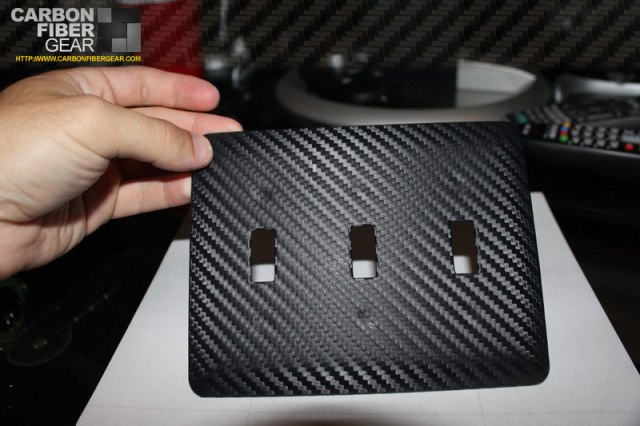 Light switch panel covered in 3M carbon fiber DI-NOC